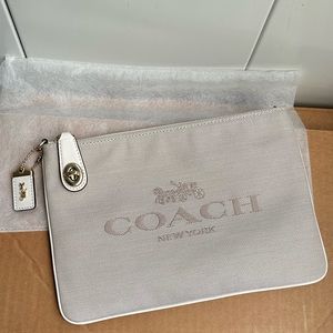 Coach Thursday show pouch with hangtag